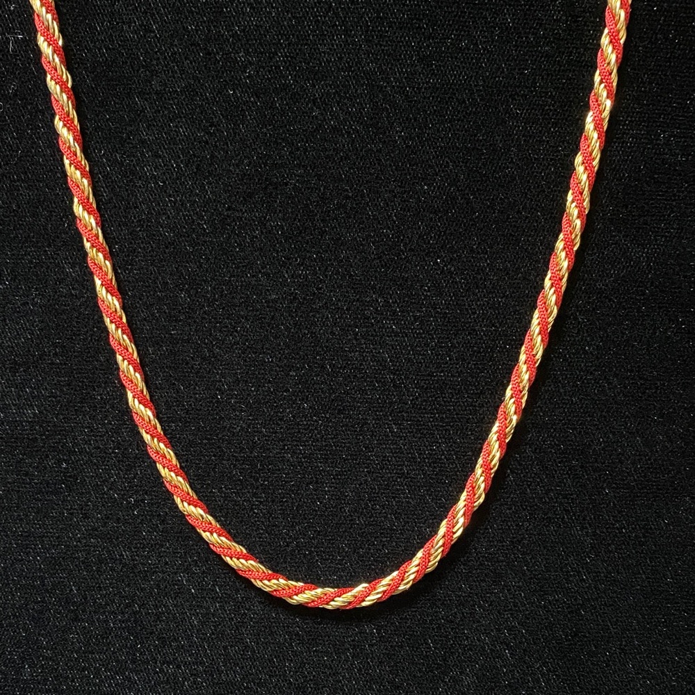 Vintage 29 1/2” long x 1/8” wide gold chain red cord twist necklace